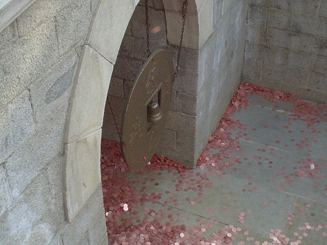 Lucky bell coin pit